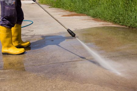 What are the benefits of professional driveway washing and sealing